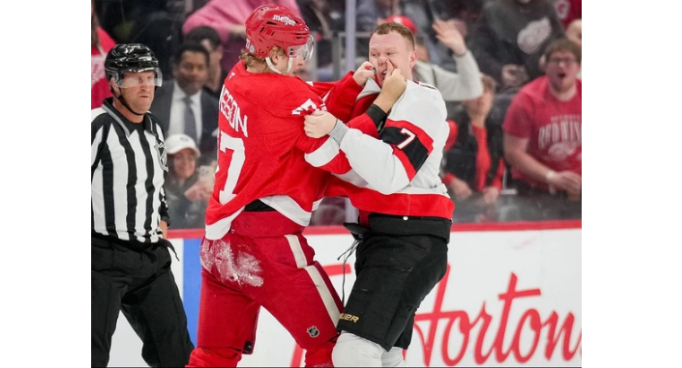 Simon Edvinsson (left) and Brady Tkachuk 