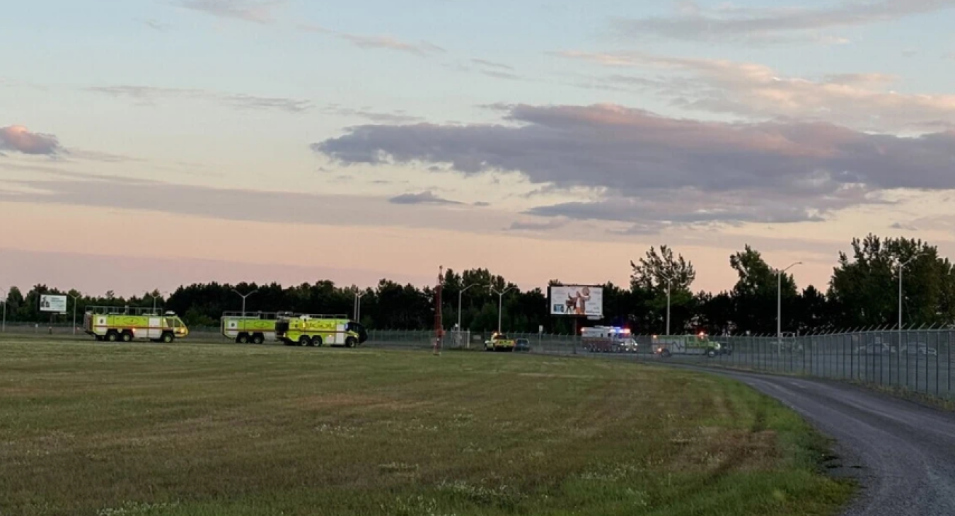 Emergency vehicles near the scene of a small plane crash near the Ottawa International Airport